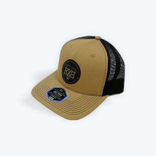 Khaki and black cap with a RXB Leather logo 
